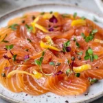 Plated Salmon Crudo with garnishes